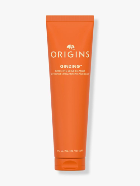Origins GinZing Refreshing Scrub Cleanser orange tube on light gray background