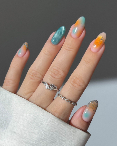 Taylor Swift TLOAS Nails blue and orange aura nails
