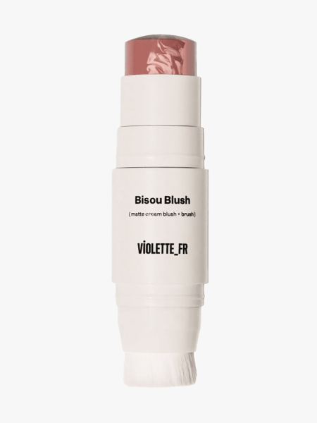Bisou Blush in Louise in branded off white twist up packaging with dual ended blush and brush applicator on light gray background