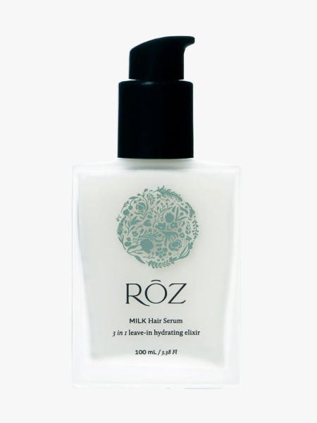 RŌZ Milk Hair Serum in branded component on a light gray background