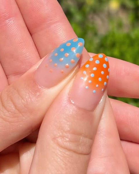 taylor swift tloas orange and blue polkadot nails